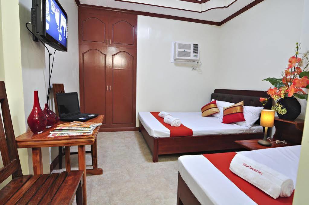 Jilian Tourist Inn Puerto Princesa Extérieur photo